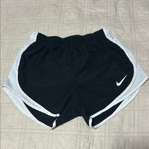 Nike Black and White Athletic Shorts with Curved Hem